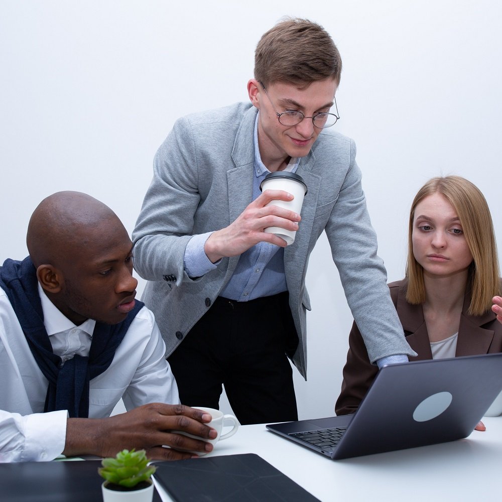 Building a Powerful Brand Identity Photo by Mikhail Nilov: https://www.pexels.com/photo/men-and-a-woman-having-discussion-together-6930556/