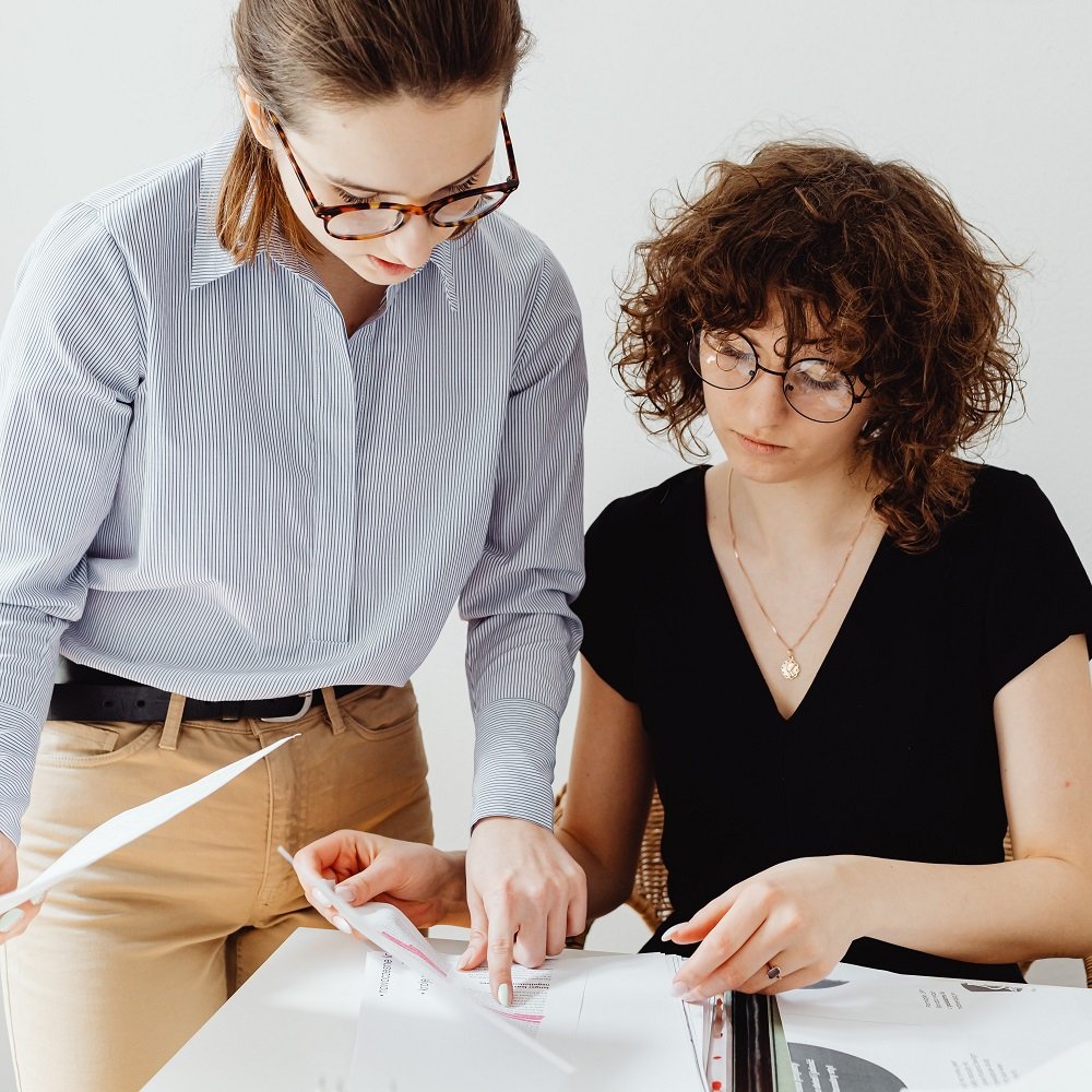 Should I consider rebranding my small business, and if so, what factors should I consider Photo by Karolina Grabowska: https://www.pexels.com/photo/two-women-looking-at-white-paper-7681092/
